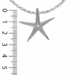Pendentif étoile de mer or blanc