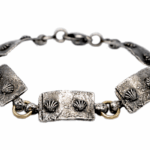 Bracelet-de-pellerin-Saint-Jacques-de-Compostelle-2-argent-or-Taillandier-bassin.png2