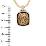 Pendentif argent os de dinosaure