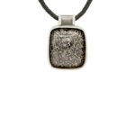 Pendentif argent os de dinosaure