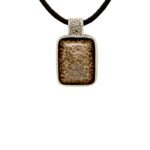 Pendentif argent os de dinosaure